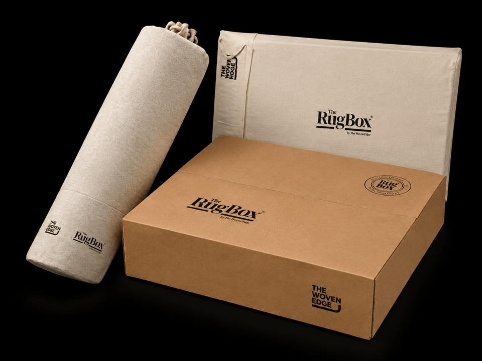 Image showing two types of cotton bag used for transporting RugBox rug and cardboard outer box used for delivery.